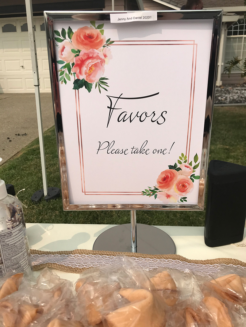 sign on a table that says Favors, Please take one!